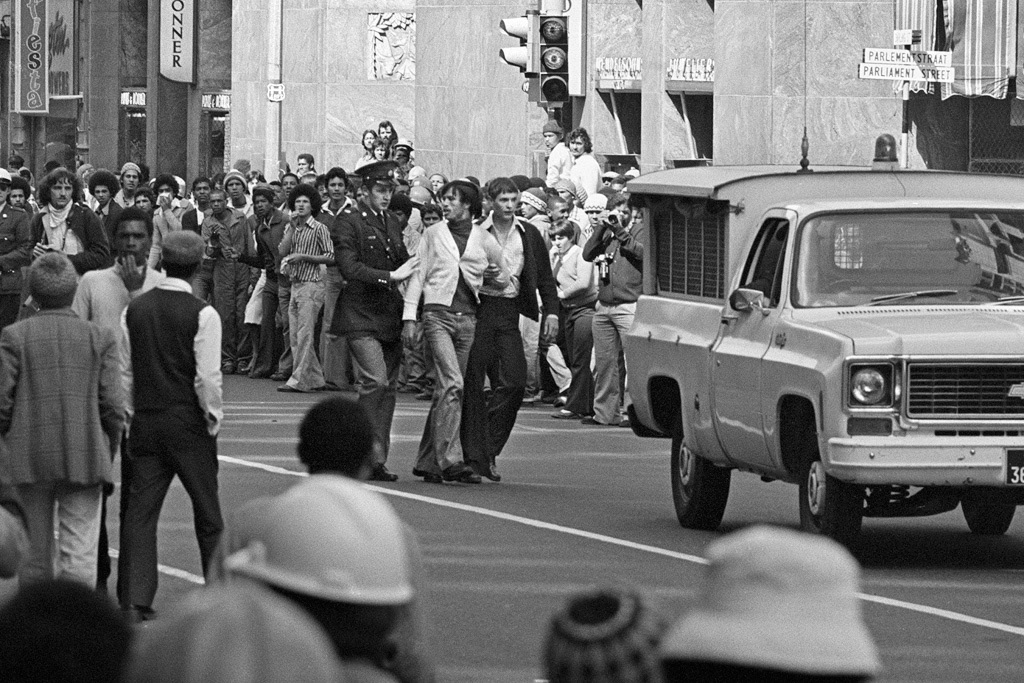 Man being arrested during protests against apartheid.