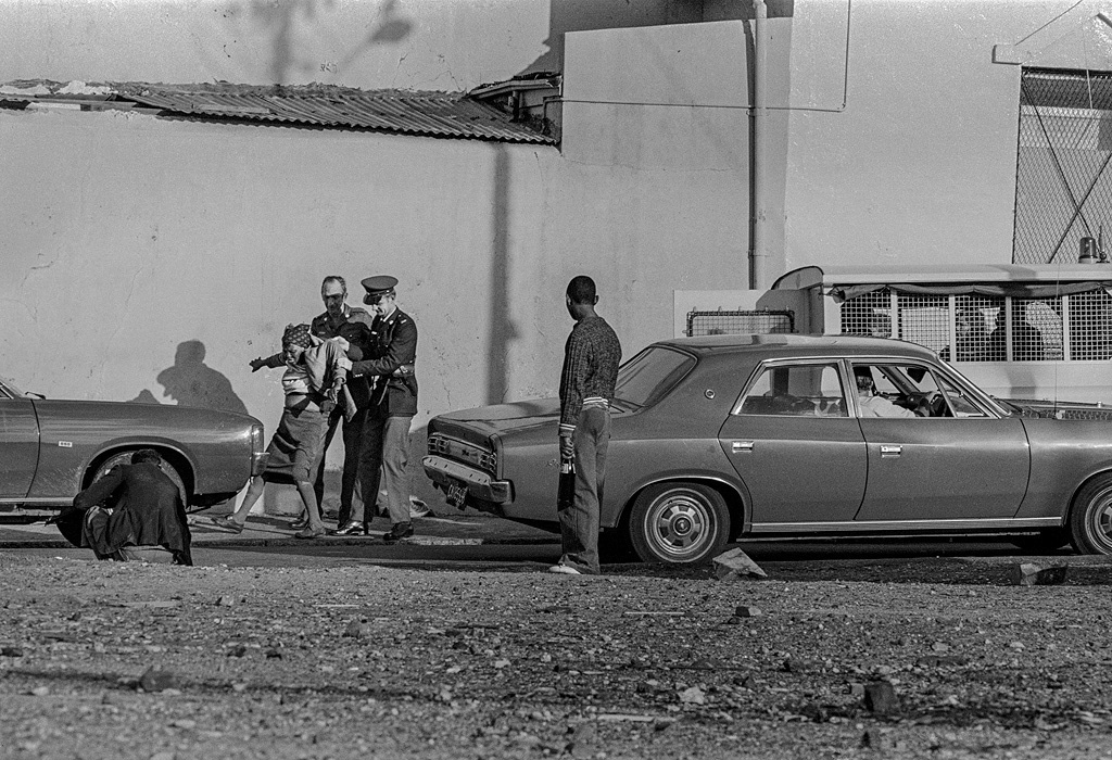 Woman being arrested, Cape Town 1976.