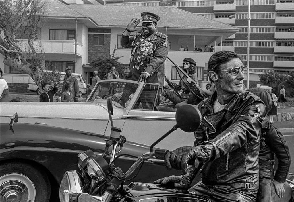 An Idi Amin look-alike, adorned with fake medals, takes part in a parade. The brutal Ugandan dictator was often mocked and cited as a justification for white rule