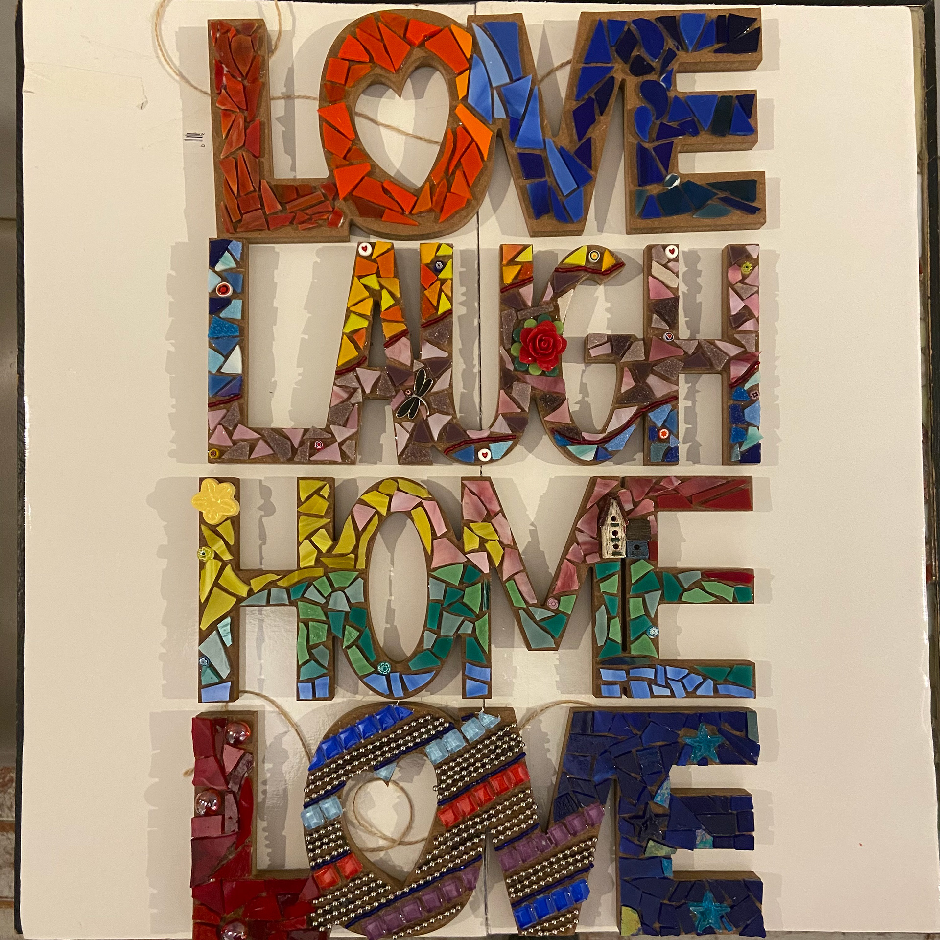 Fantastic (pre-grout) mosaic Wall Words by these amazing artists!