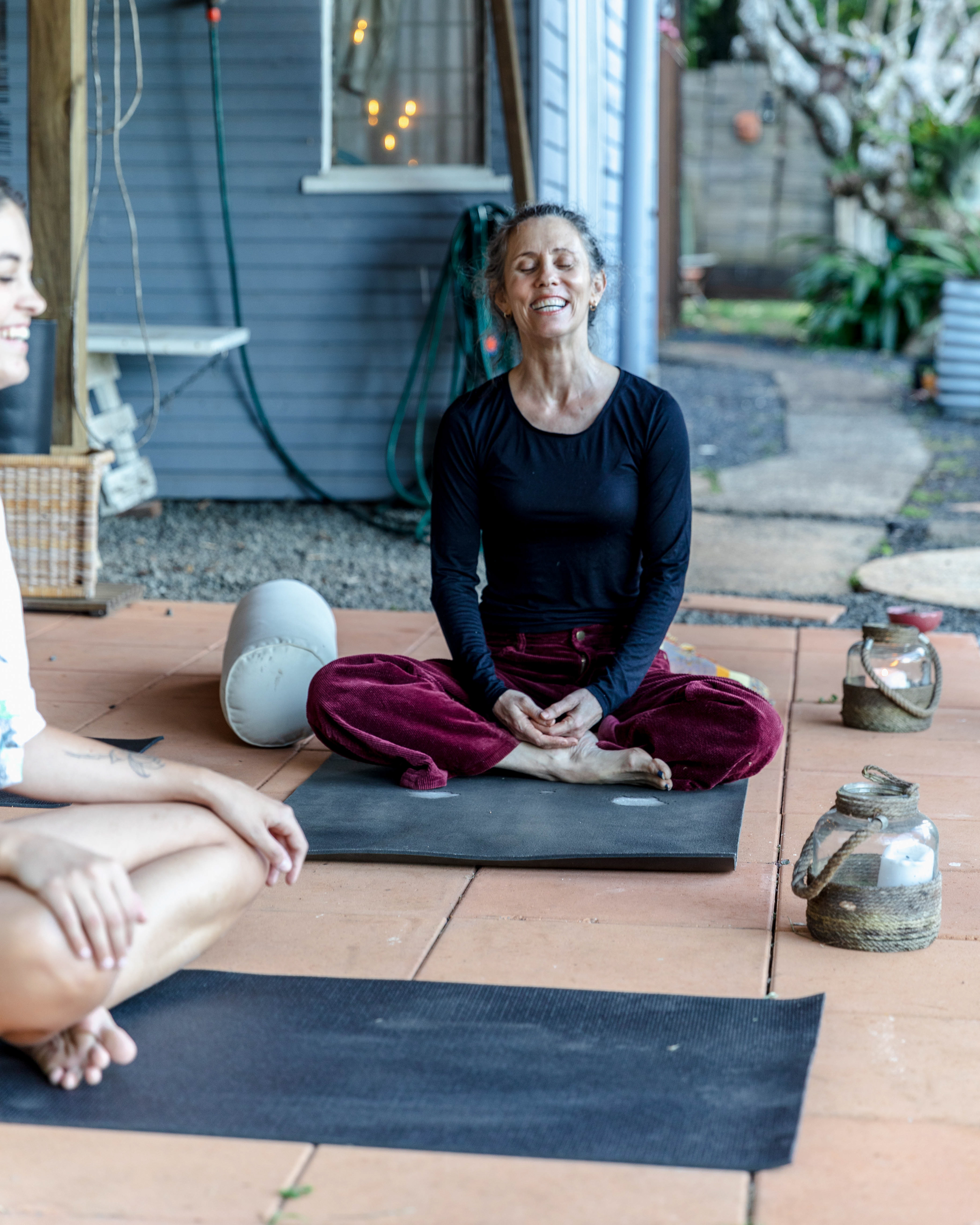 Sue teaching yoga at Glamping Retreat in the Rainforest, New South Wales