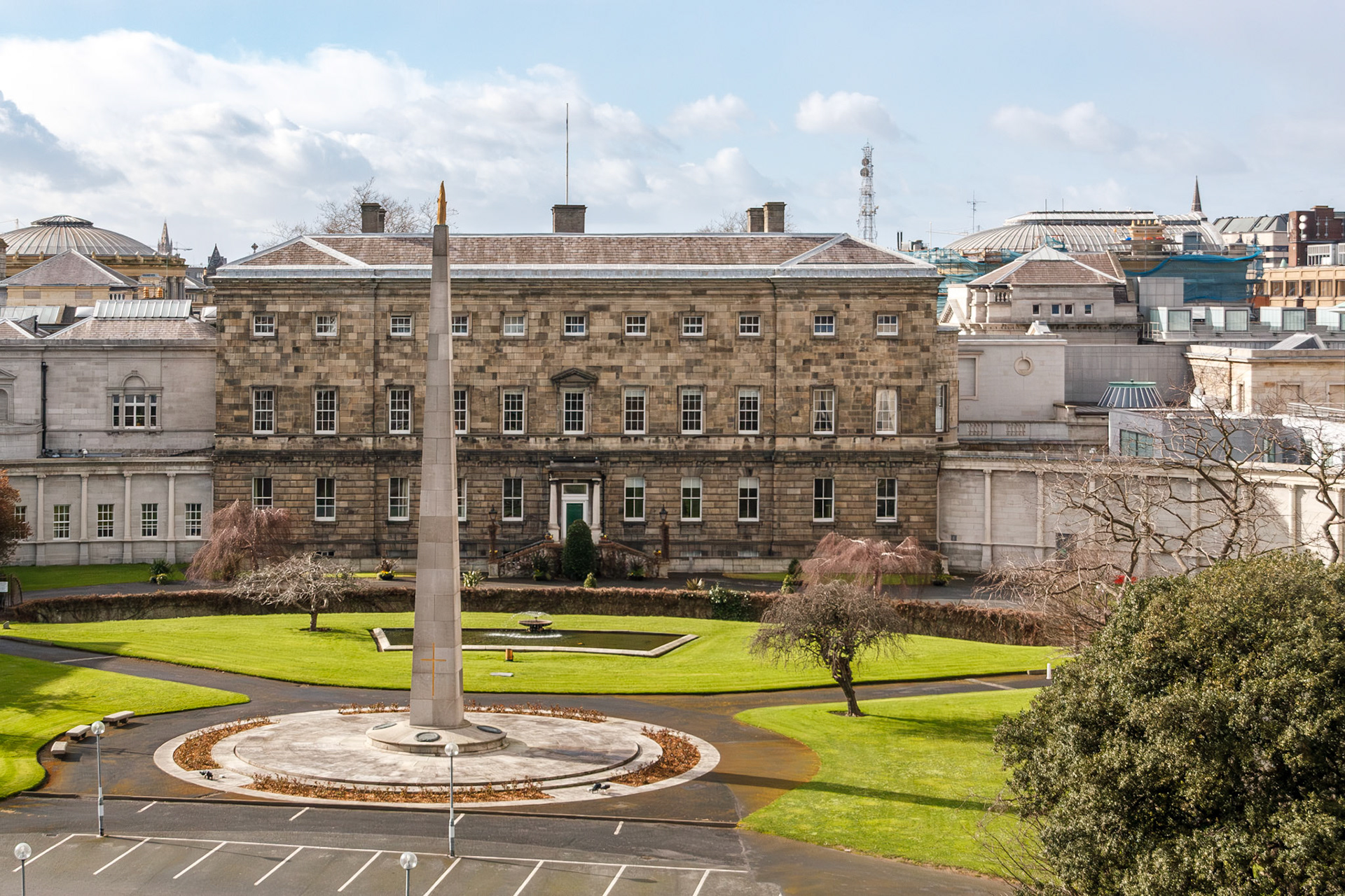 Historic stone building and obelisk monument