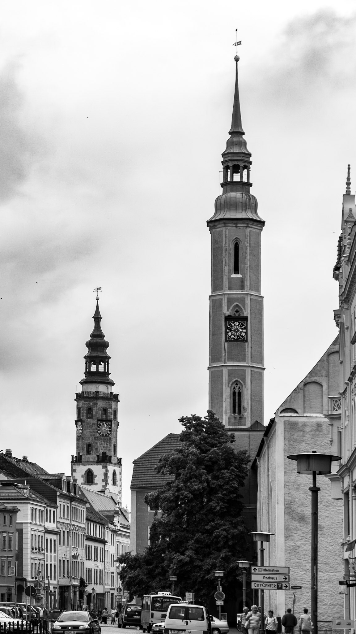Monochromatic street view of historic church towers