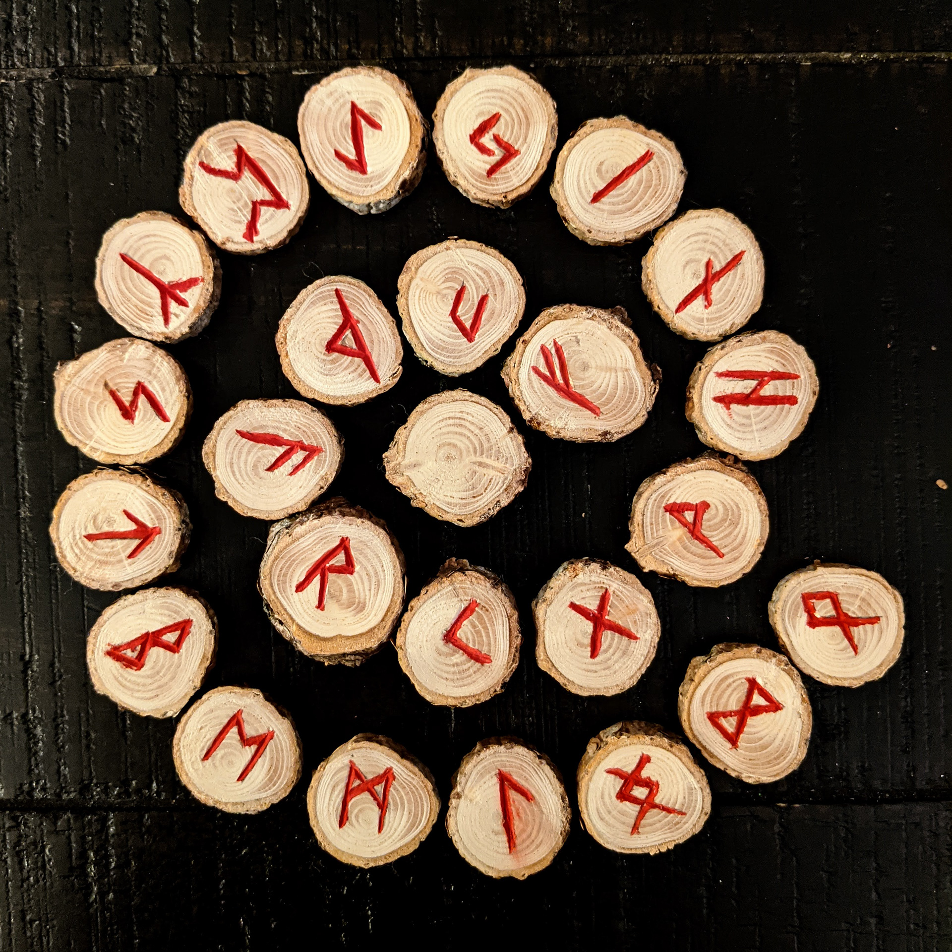 Rune divination set carved on pine and painted