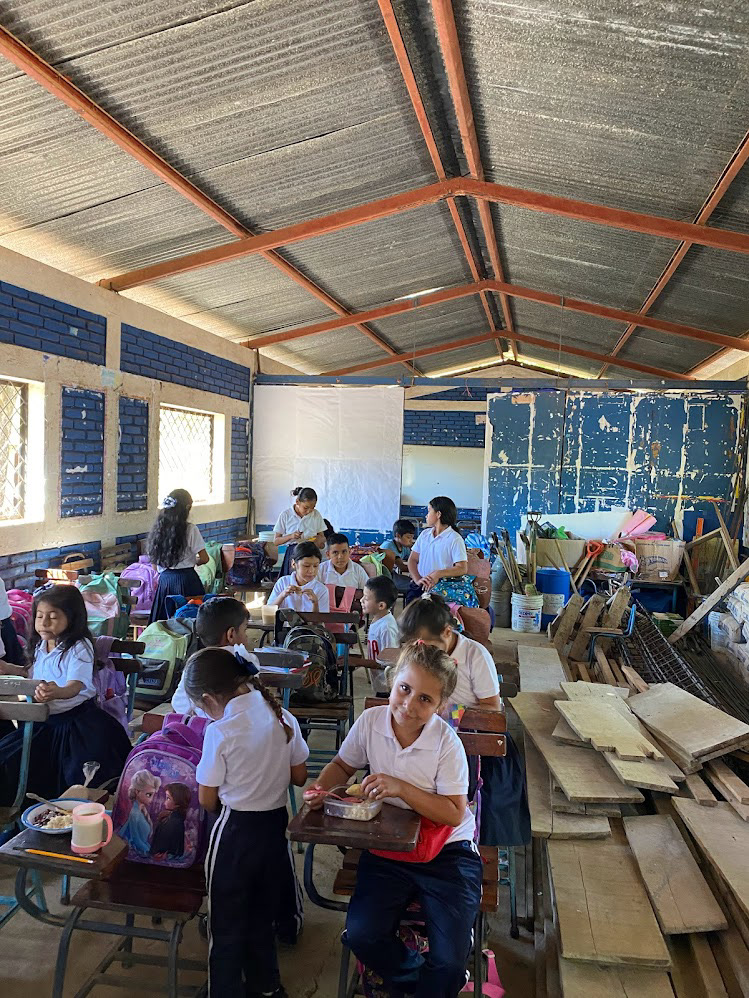 Meeting the kiddos! This is the existing school next to the one we are building. It is too small to fit all the kids in El Borbollón.