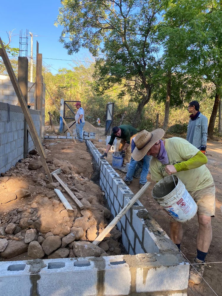 Once it was level, we were able to put in the foundation for the sidewalk.