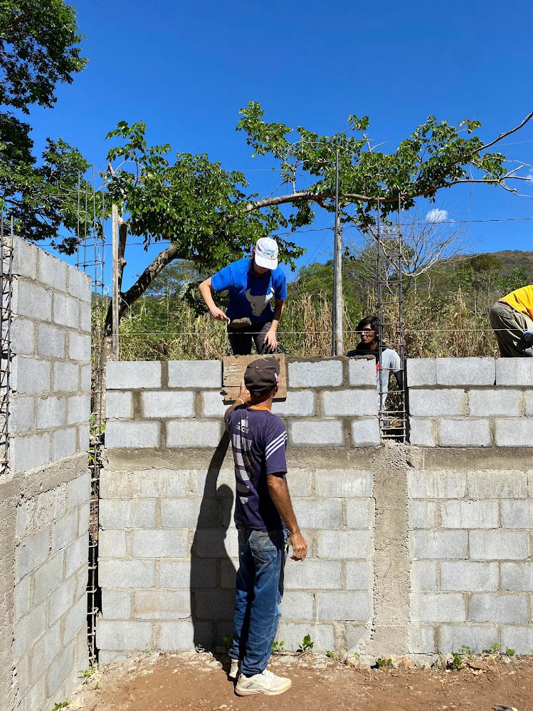 Laying bricks and mortar