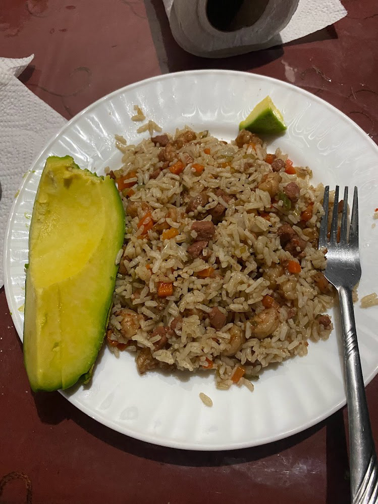 Shrimp, sausage, rice, and the best avocado I've had in my life!