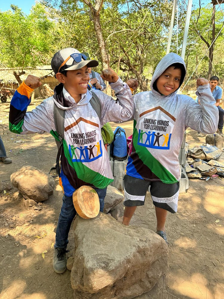 Hector and Jovani rocking some Linking Hands shirts.