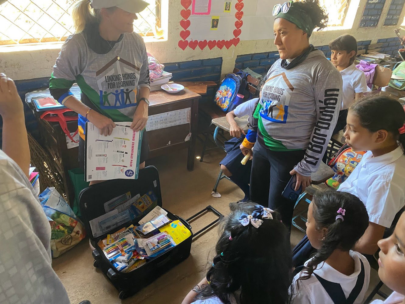 Some group members brought suitcases filled with school supplies.