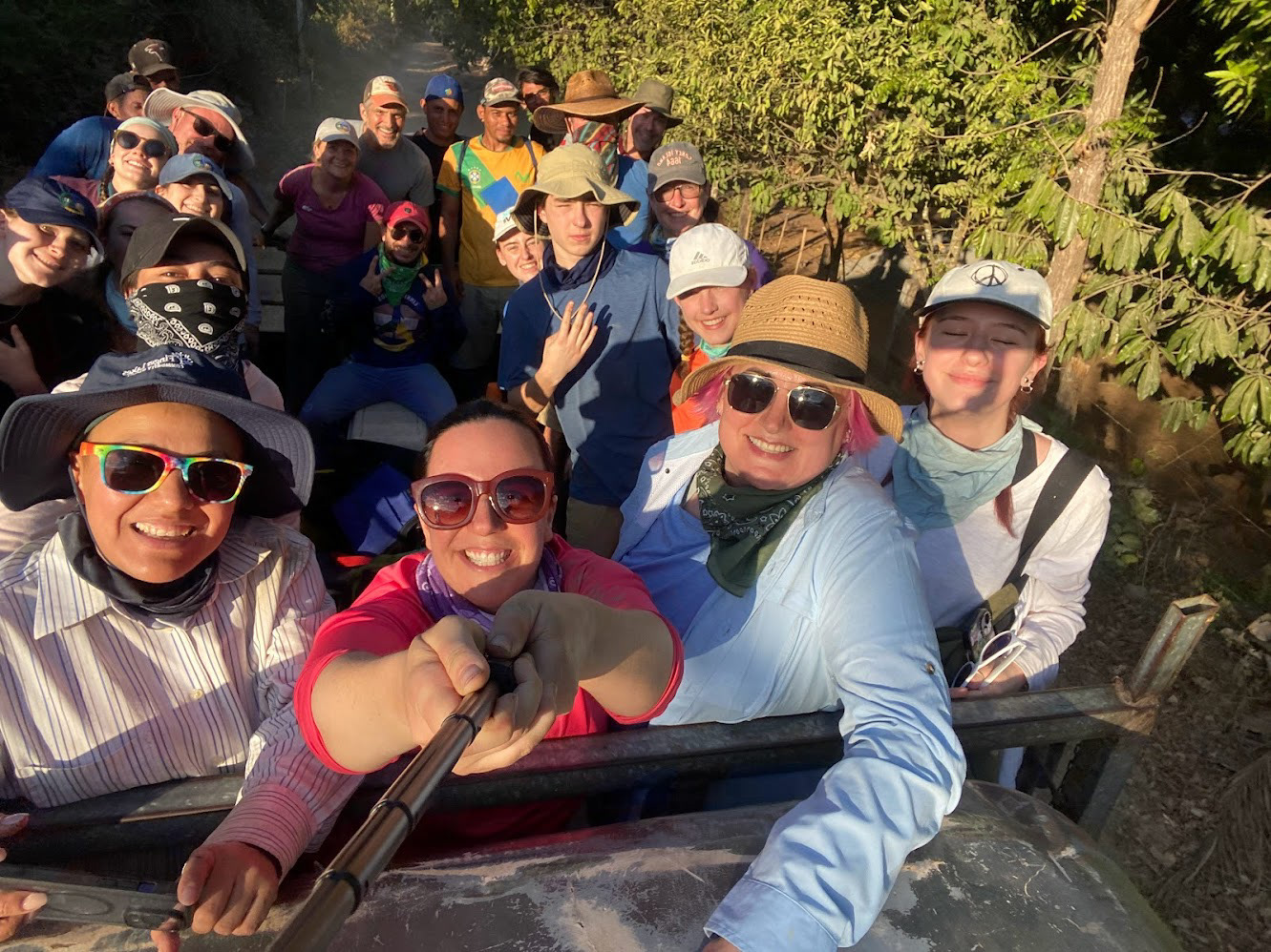 Driving to the school worksite in El Borbollón - about 30 mins away. Our transportation for the week is on the back of this truck!