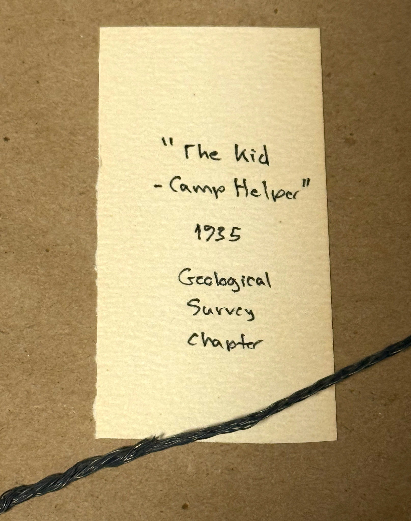 Back Notation: 'The Kid - Camp Helper'