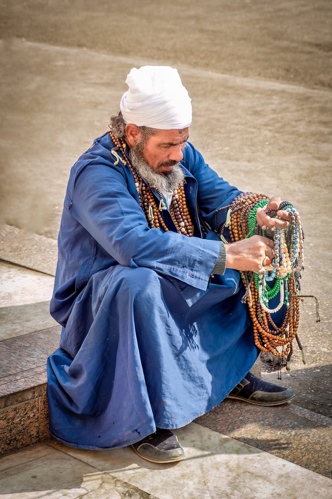 Prayer bead seller outside Mosque of Sayyidna al-Hussein