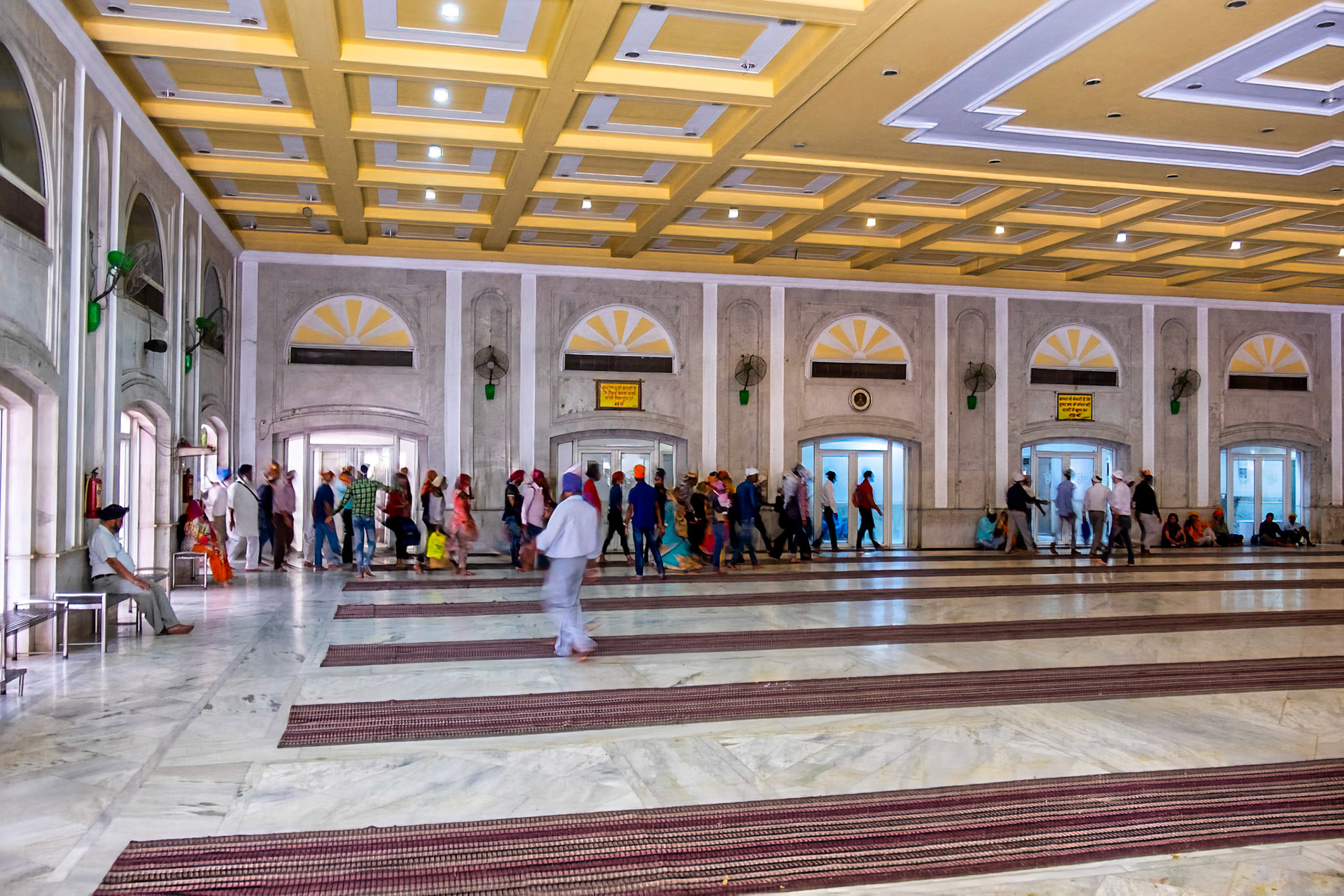 People entering dinnning hall in Sikh temple