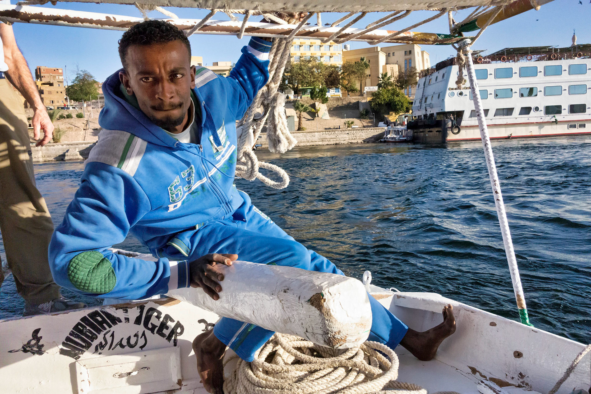 Steersman on felucca at Aswan