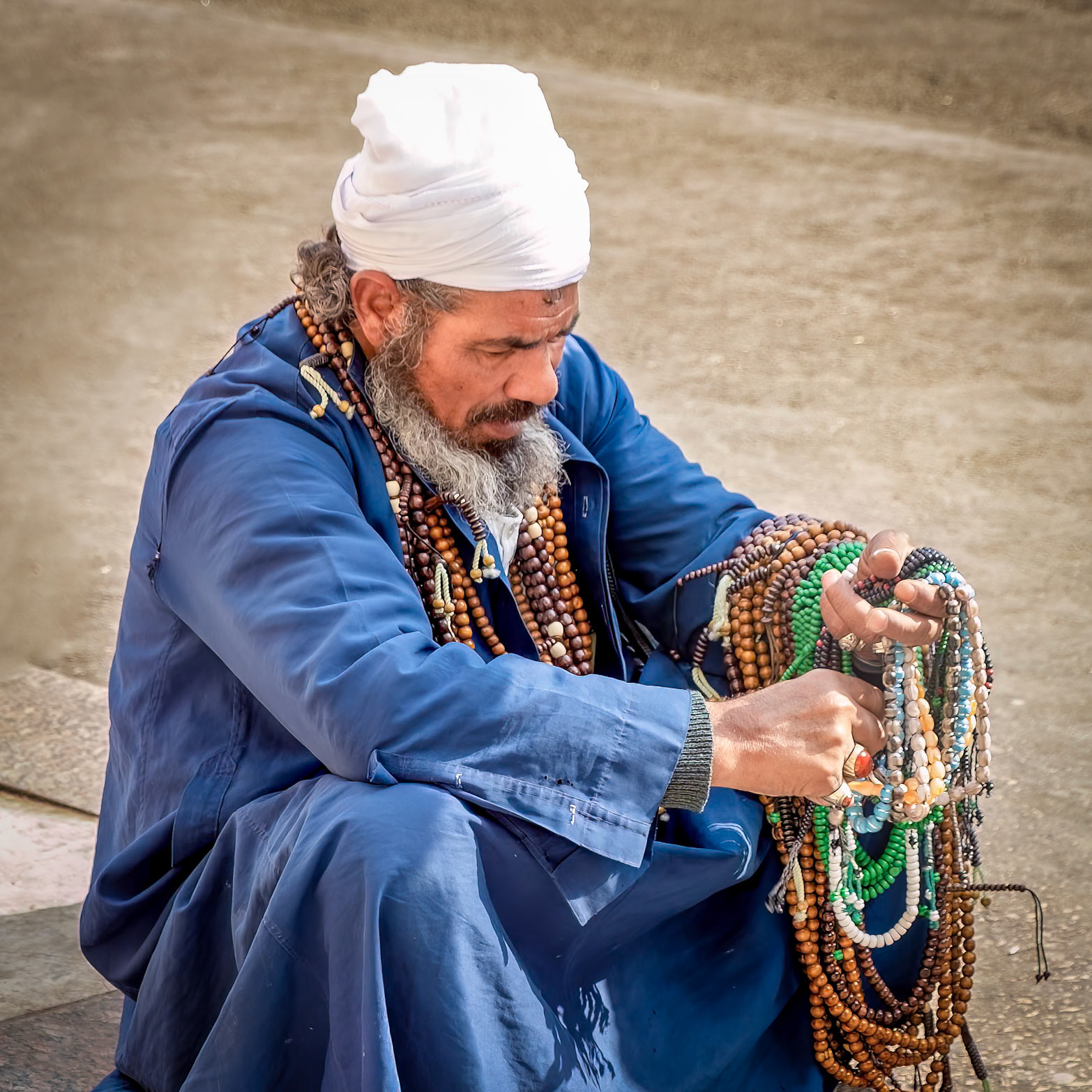 Prayer bead seller outside Mosque of Sayyidna al-Hussein