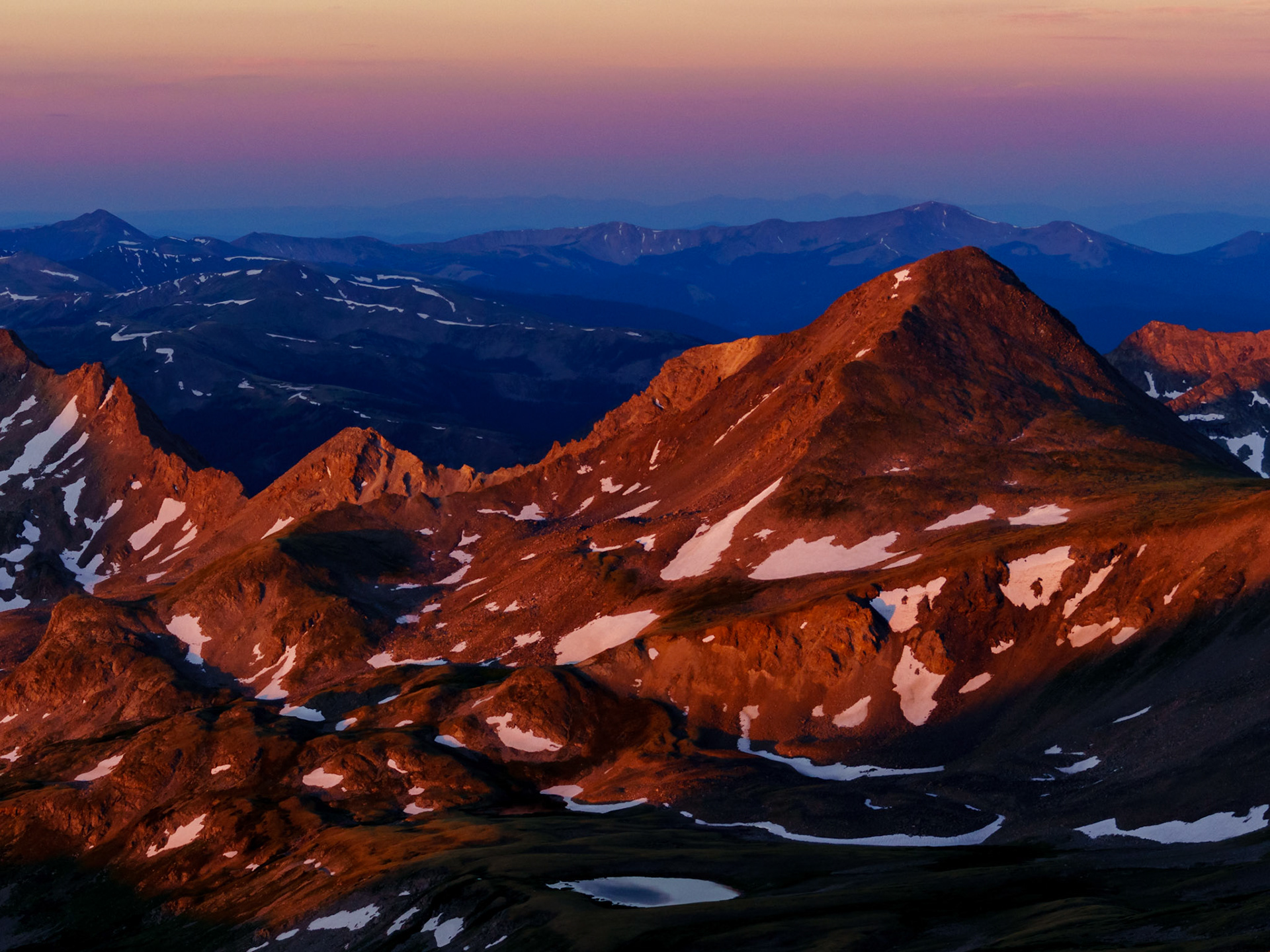 Pike and San Isabel National Forest, After completing a long overnight hike to the summit of a 14,000 foot mountain (14er), I waited for the sunrise in hope of capturing this alpenglow on another nearby 14er.