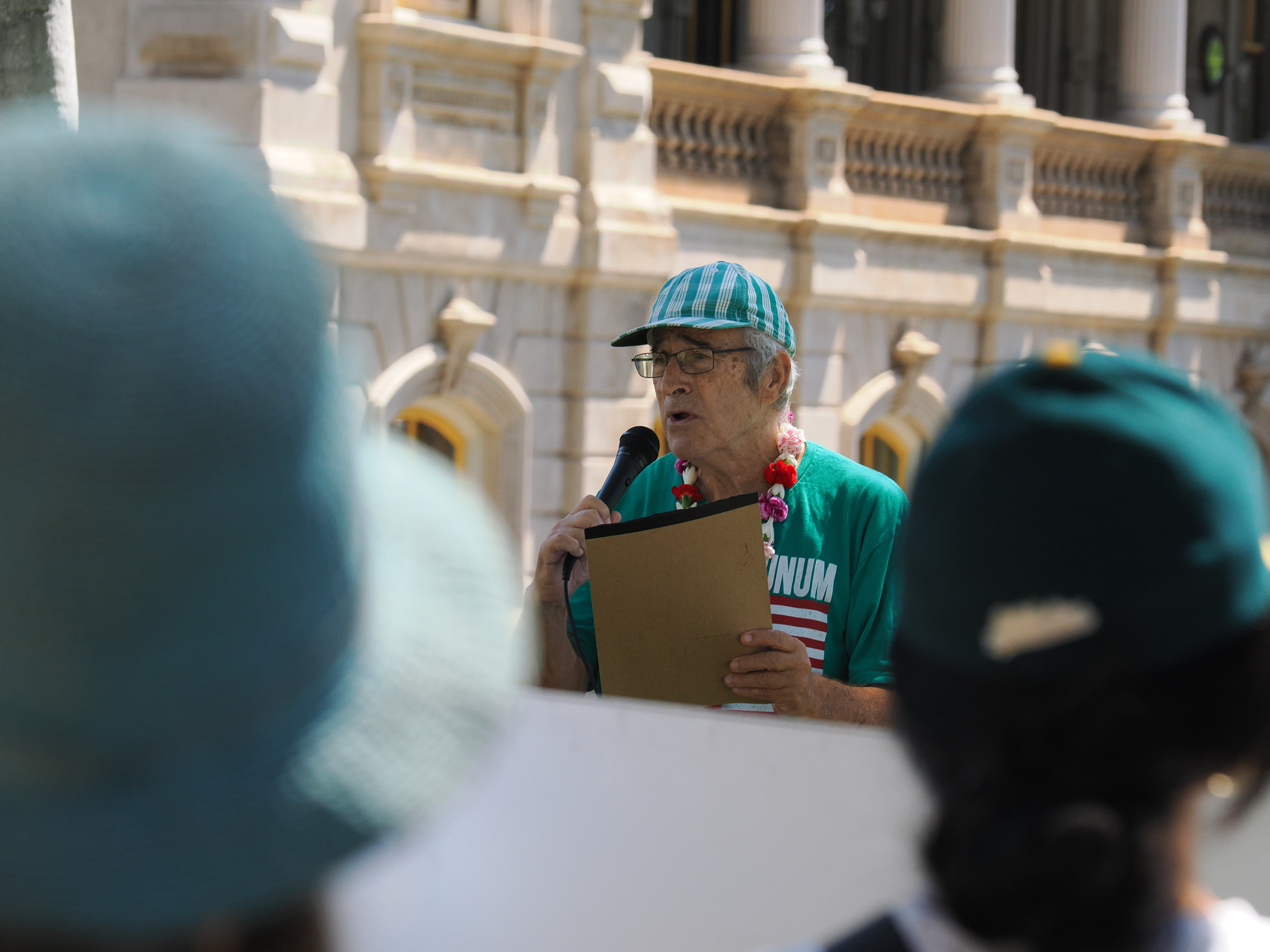 AIR co-founder Chuck Freedman reads remarks by Wendy Mink, daughter of Patsy Mink: In my mother’s lifetime, it was people like you who made our polity more democratic, Who made rights visible and more enforceable, and who insisted that there is no justice if not for all. Today our democracy will survive only if we rise up to defend these principles.” 