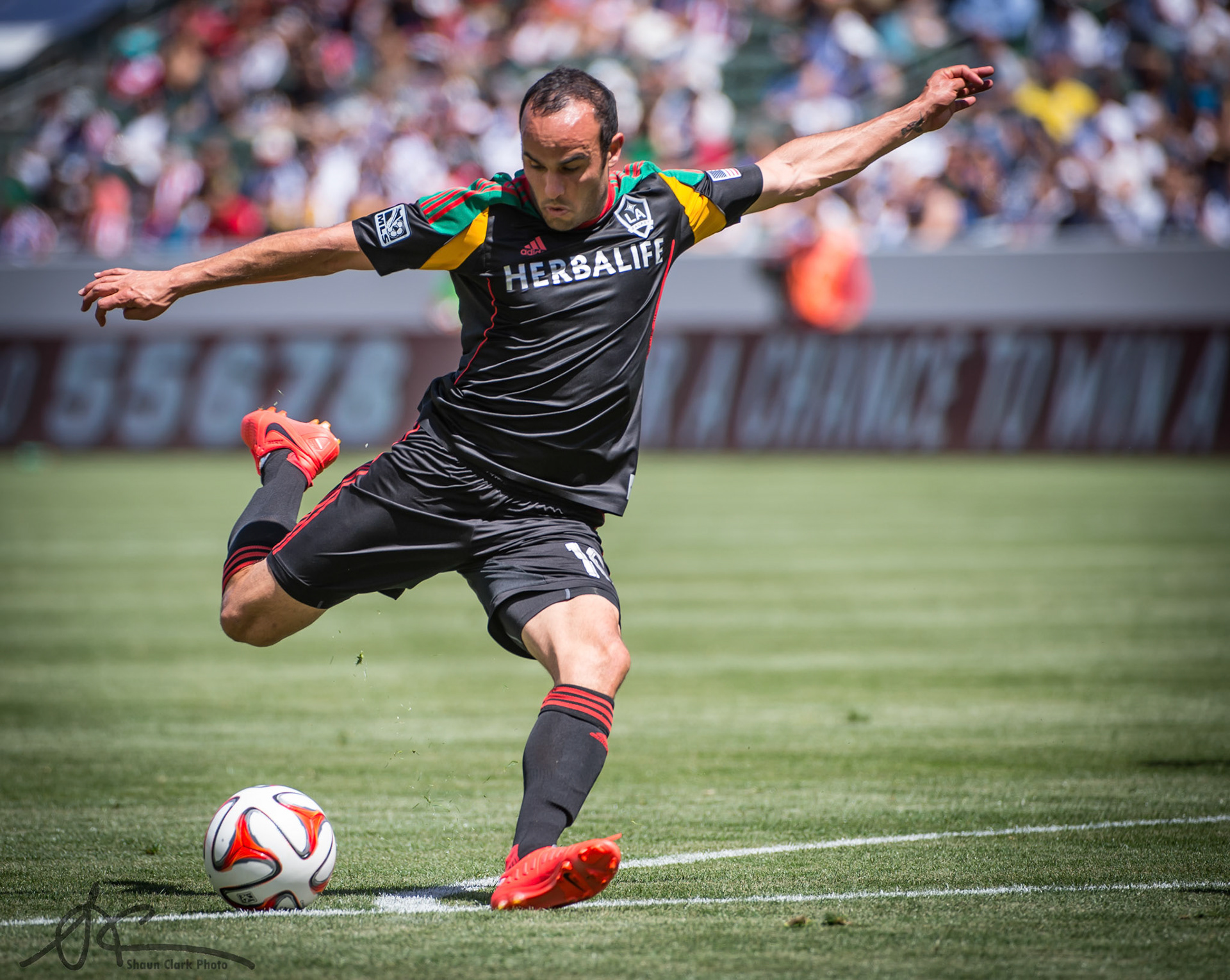 Los Angeles, CA - April 6, 2014:  Landon Donovan (#10) of the Los Angeles Galaxy takes a hot on goal during the Los Angeles Galaxy v. Chivas USA match at the StubHub Center (Photo: Shaun Clark).