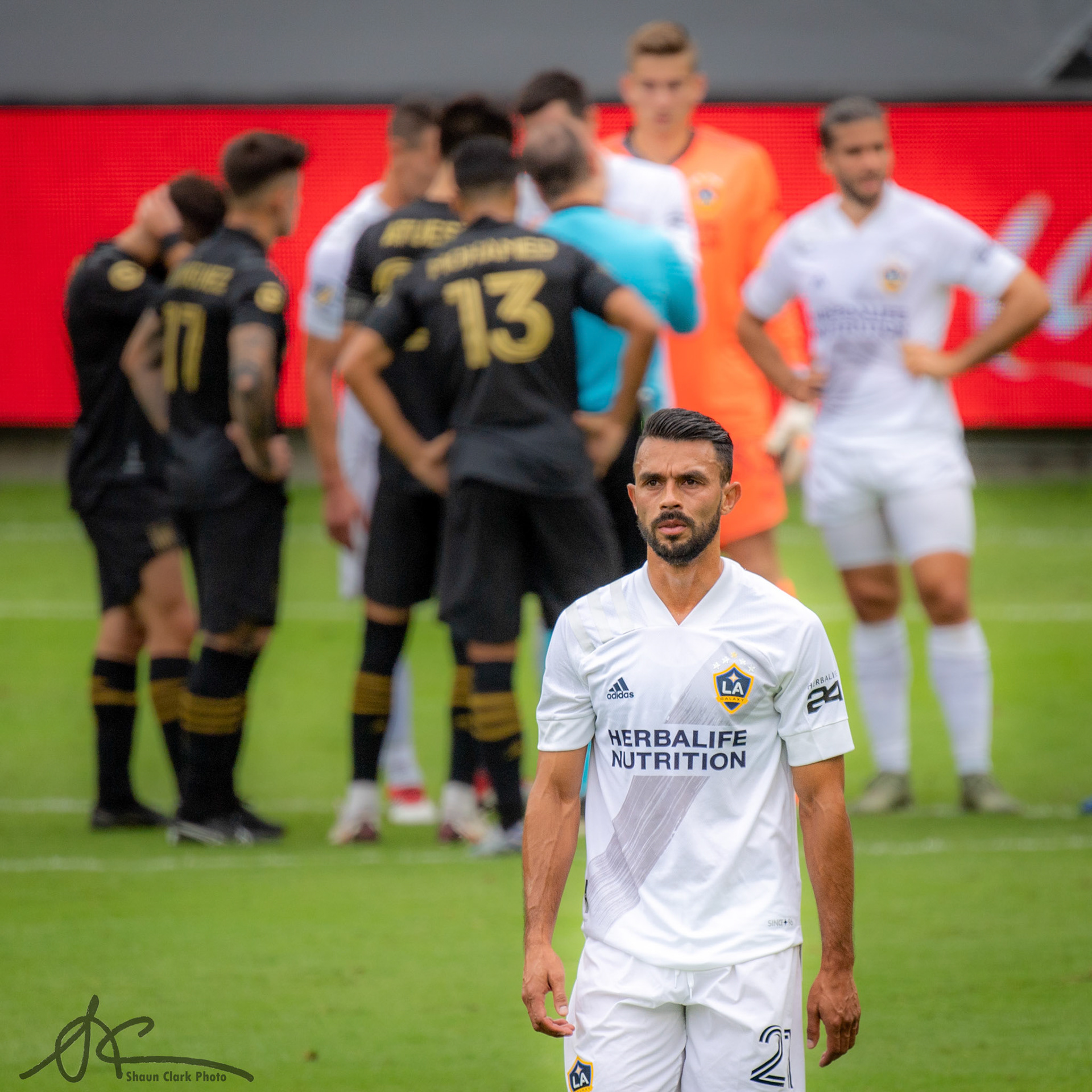 LOS ANGELES, CA - OCTOBER 25: Giancarlo Gonzalez #21 of Los Angeles Galaxy leaves the field after receiving a red card  during the match against Los Angeles FC at the Banc of California Stadium  on October 25, 2020 in Carson, California.  Los Angeles FC won the match 2-0  (Photo by Shaun Clark/Getty Images) *** Local Caption ***  Giancarlo Gonzalez