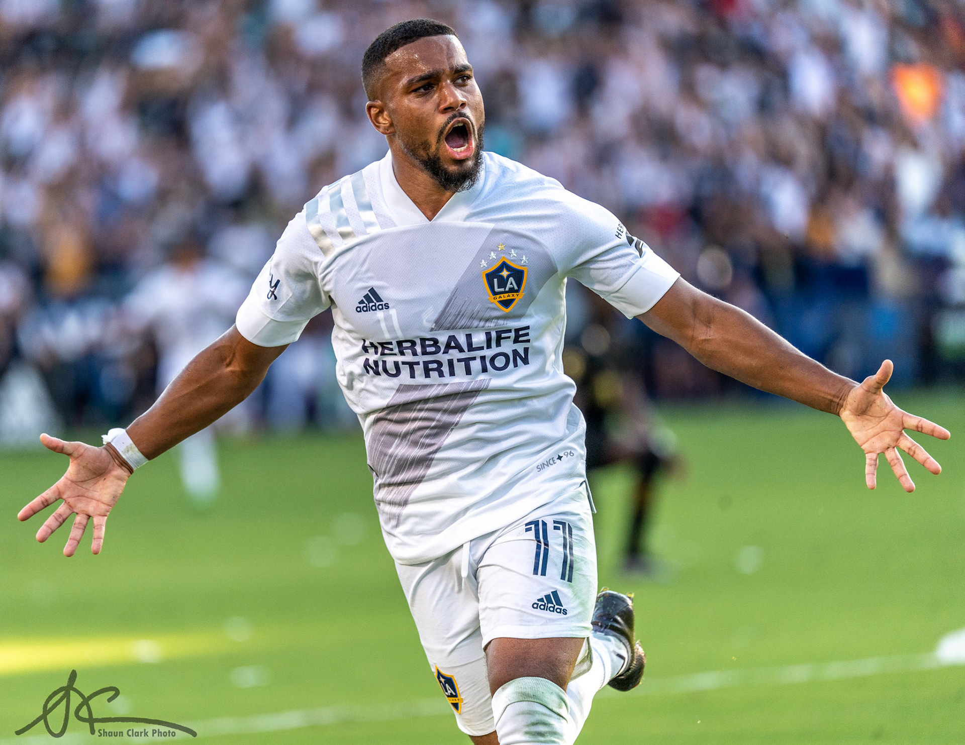 CARSON, CA - OCTOBER 3:  Samuel Grandsir #11 of Los Angeles Galaxy celebrates his goal during the match against Los Angeles FC at the Dignity Health Sports Park on October 3, 2021 in Carson, California.  Los Angeles Galaxy won the match  (Photo by Shaun Clark/Getty Images) *** Local Caption *** Samuel Grandsir