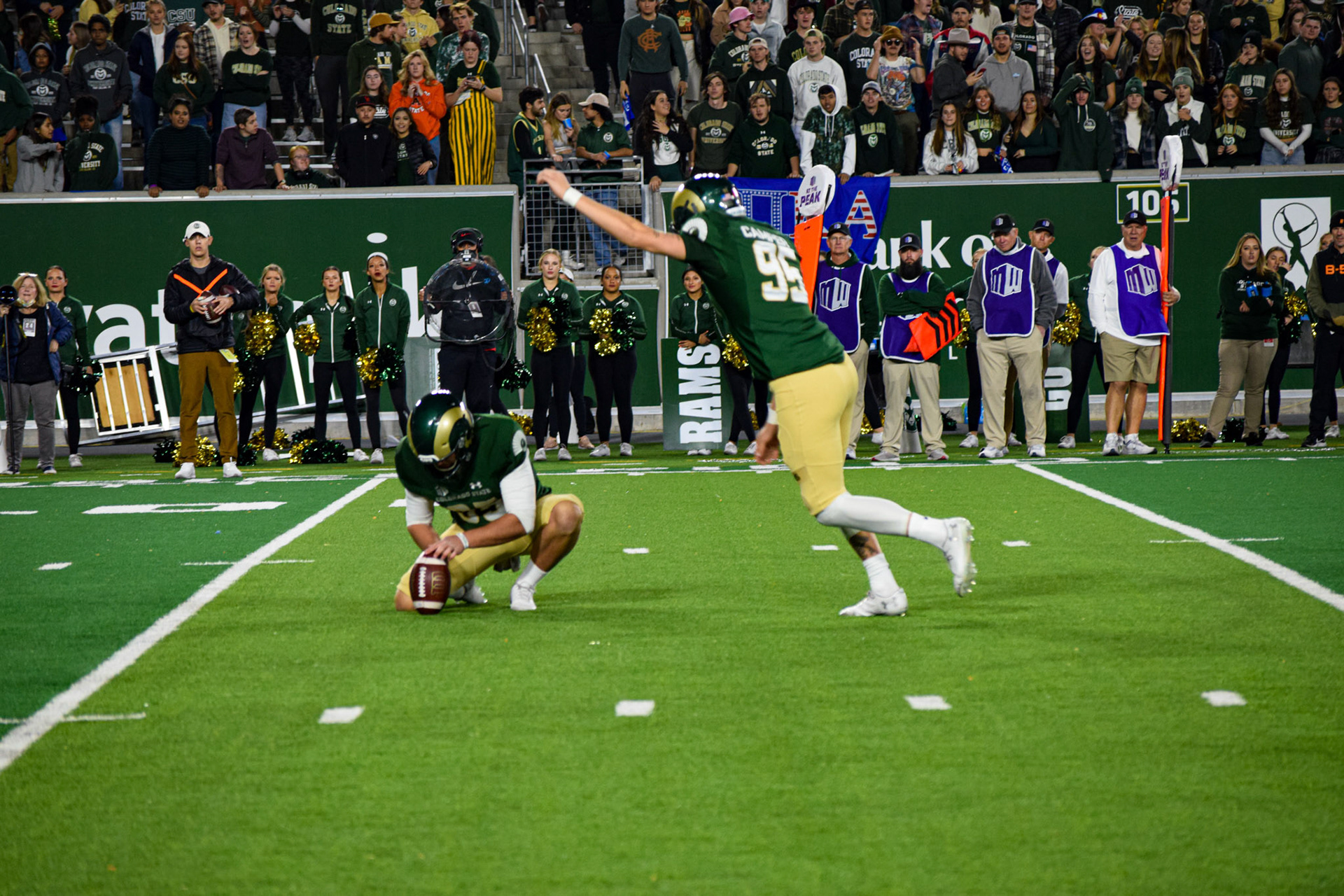 Cayden Camper kicking a field goal