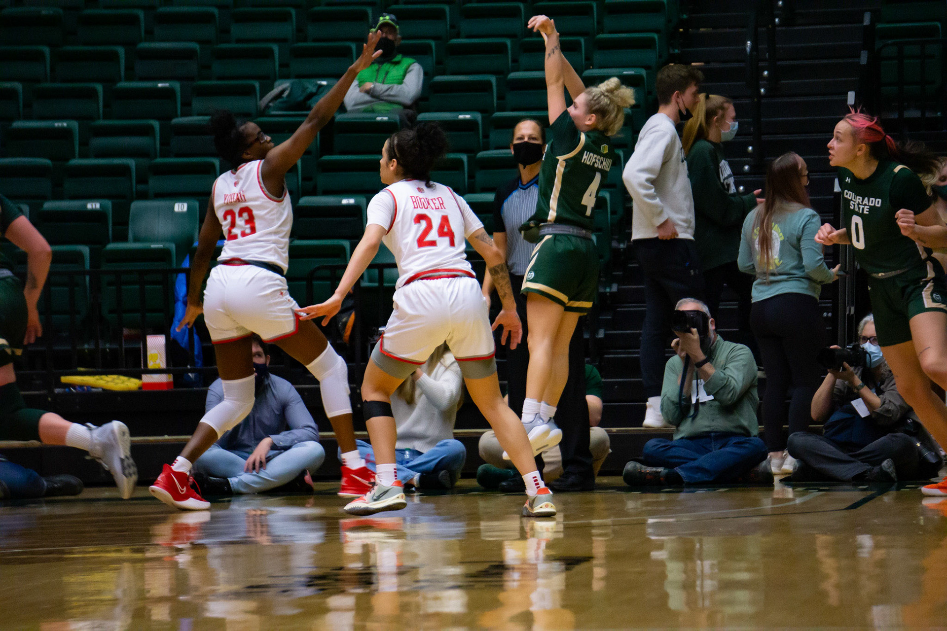 Mckenna Hofschild shooting a three point shot
