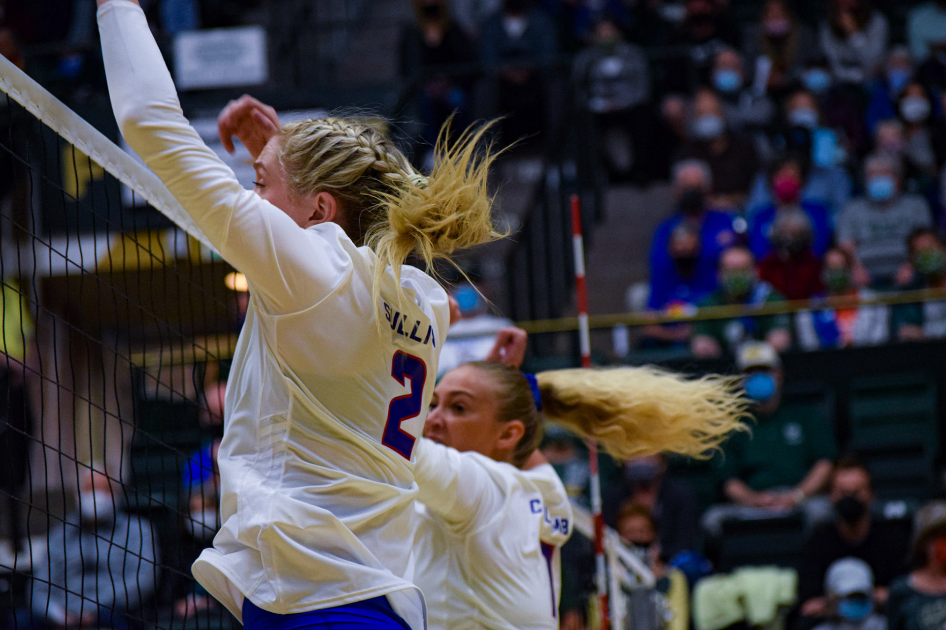 Annie Sullivan and Sasha Colombo making a block