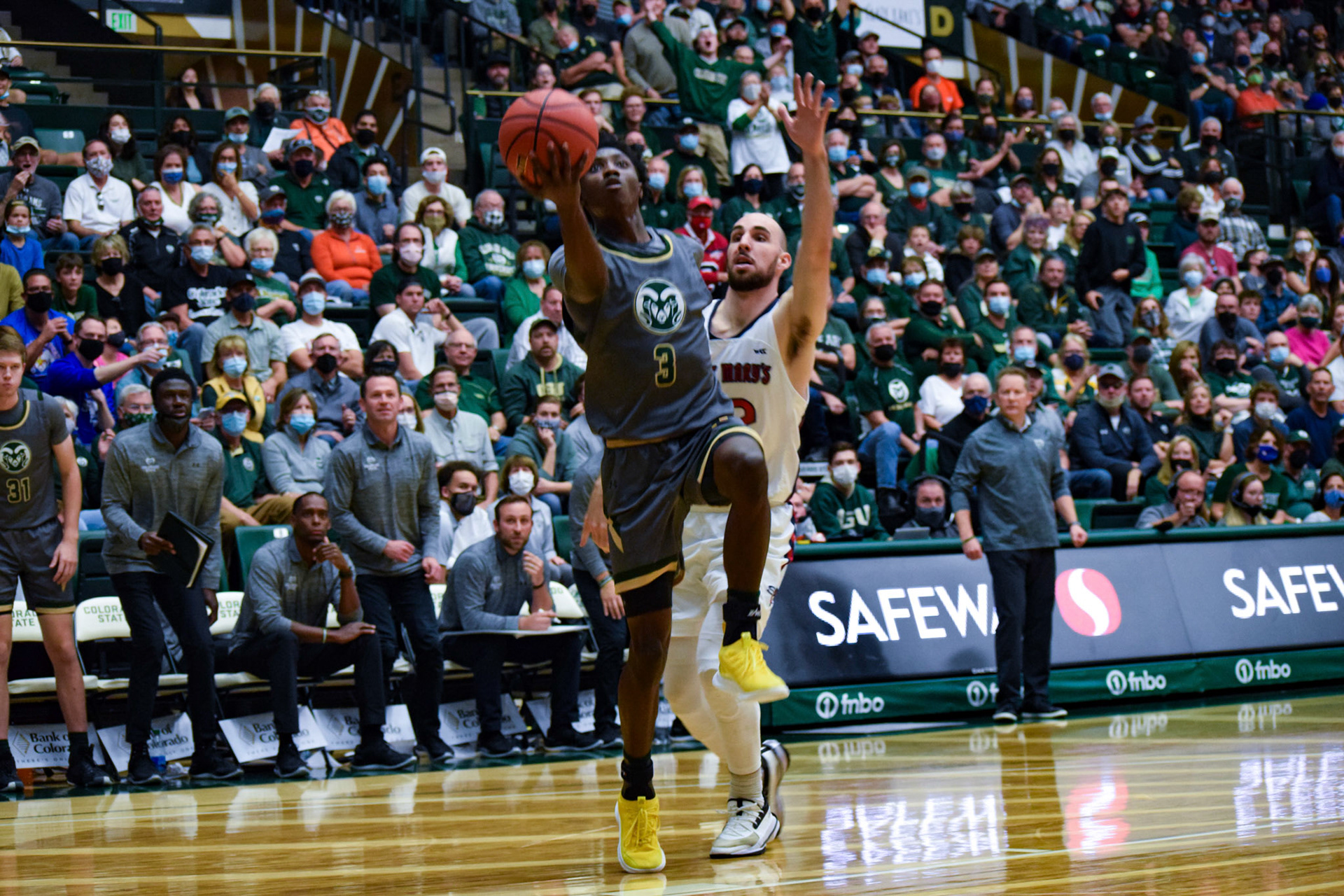 Kendle Moore shooting a layup