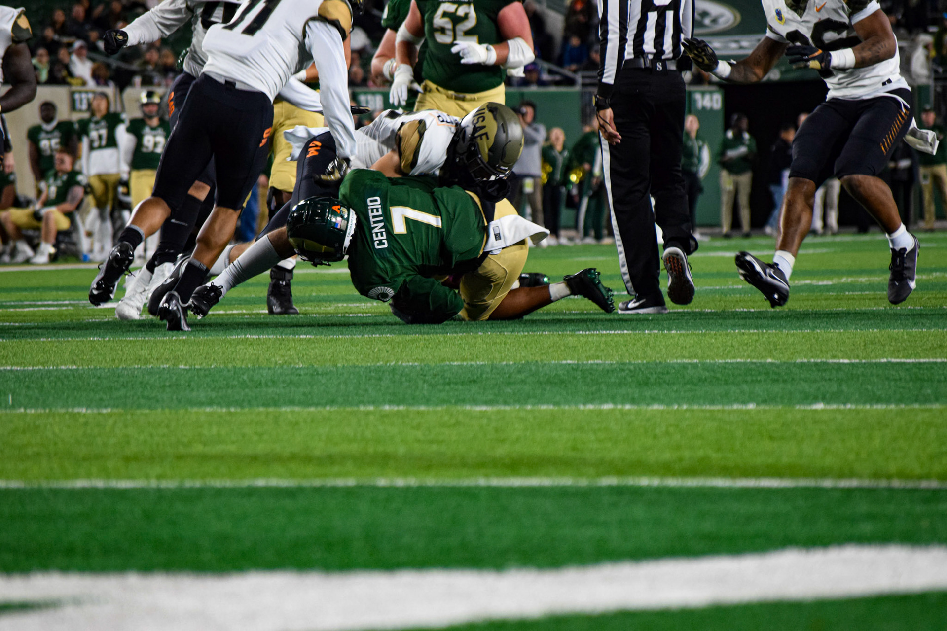 Todd Centeio getting tackled after a run