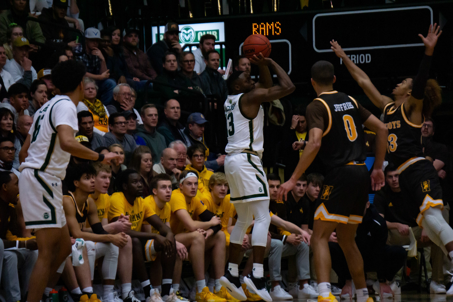 Chandler Jacobs shooting a three point shot