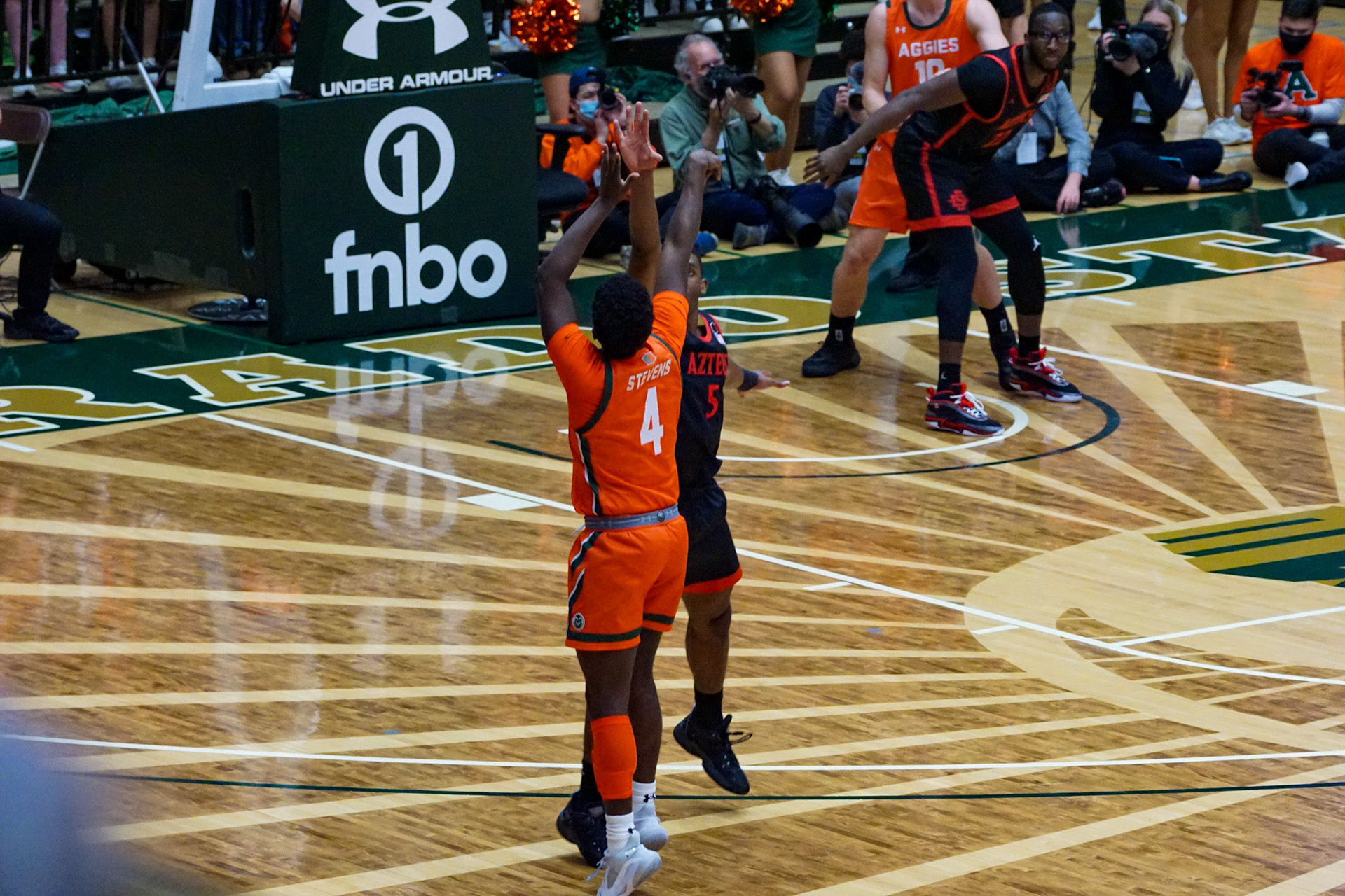 Isaiah Stevens shooting a three point shot