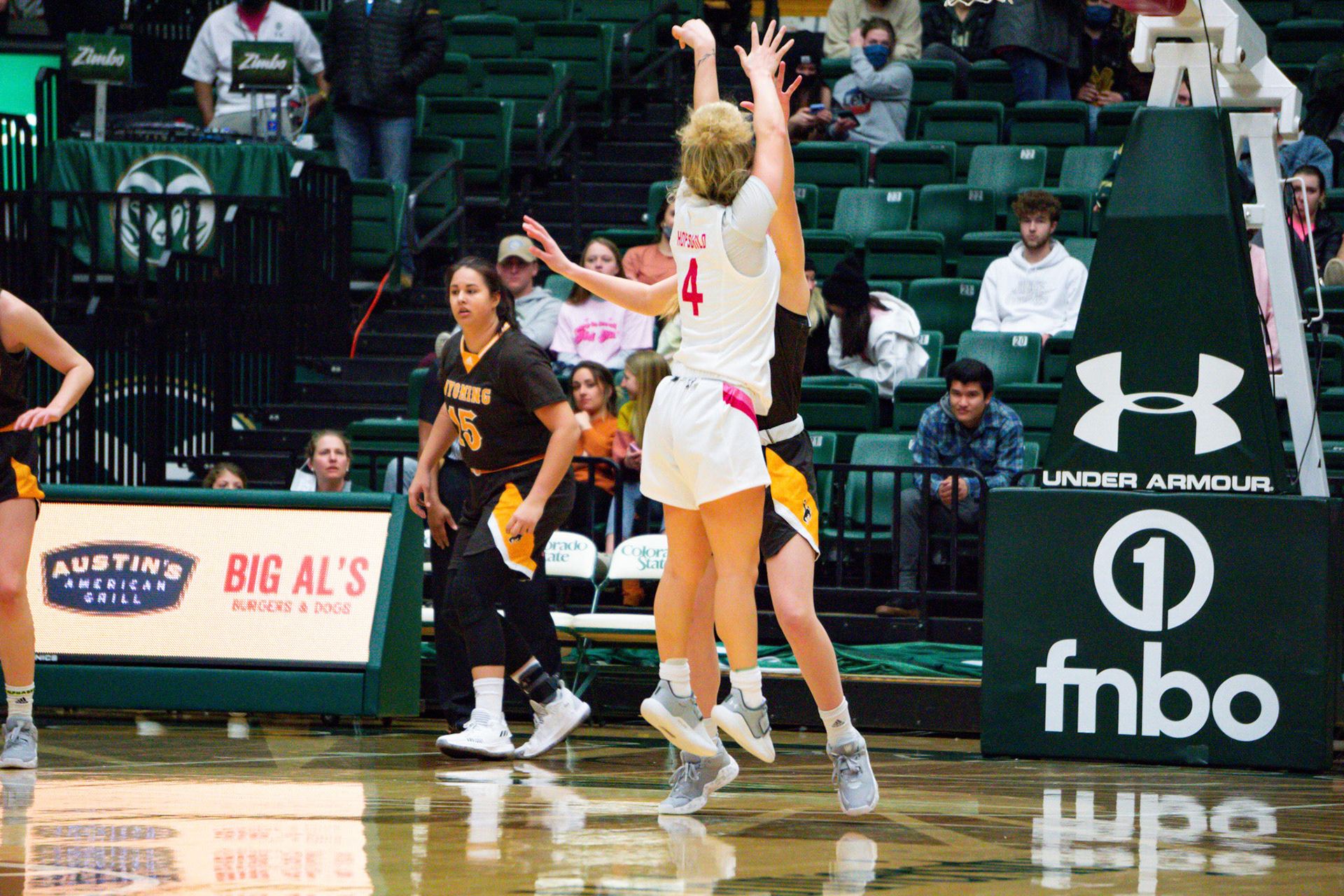 Mckenna Hofschild shooting a three point shot