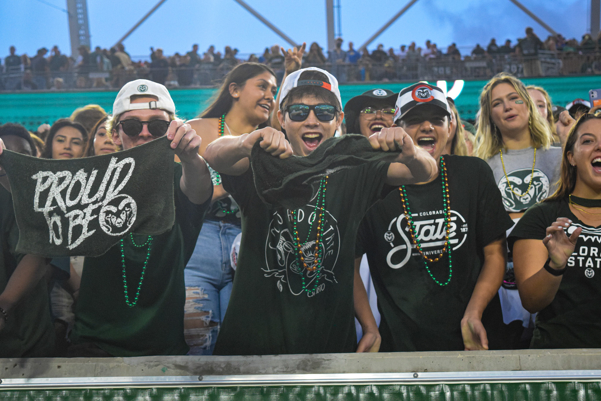 Fans cheering at a CSU Football Game