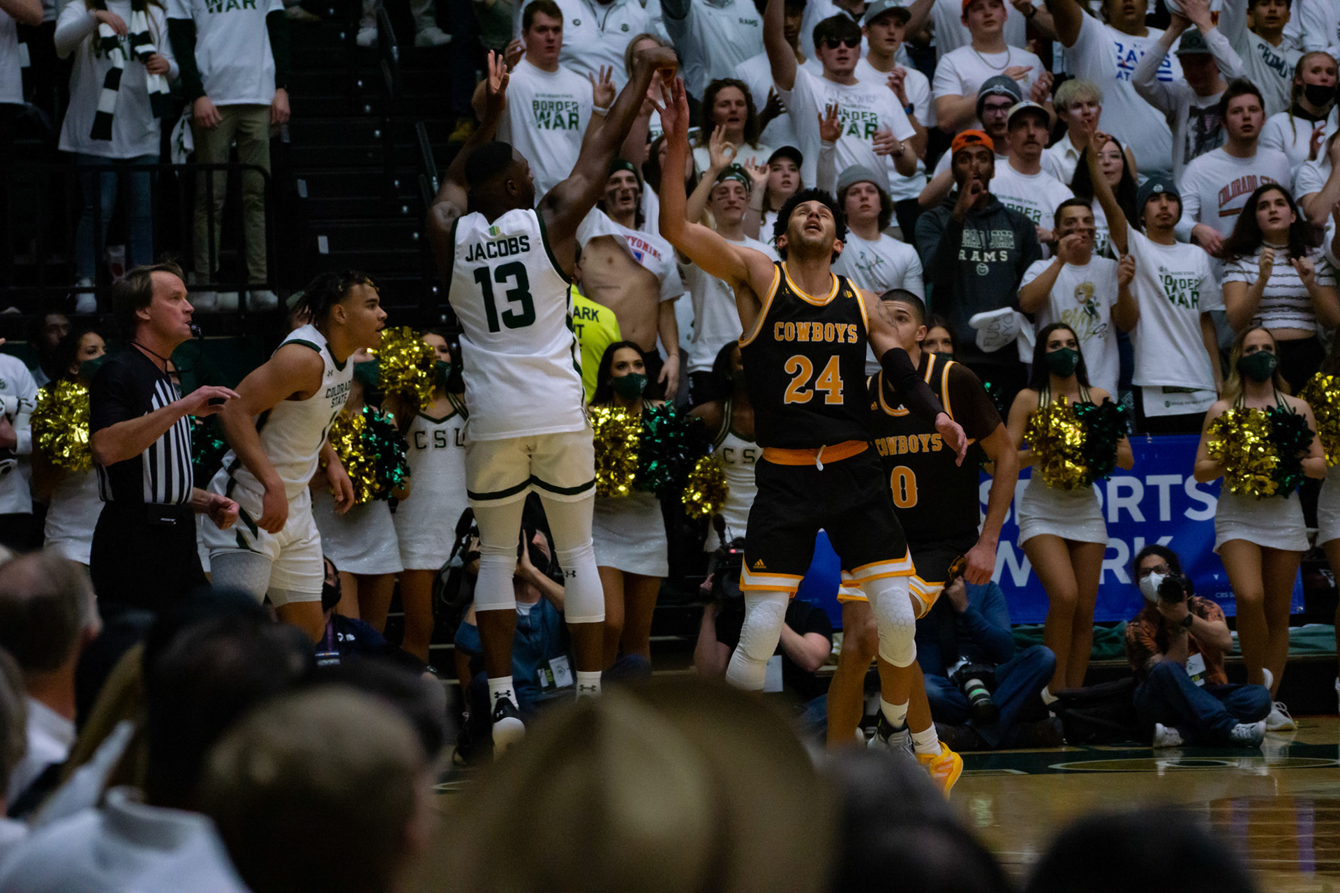 Chandler Jacobs shooting a three point shot