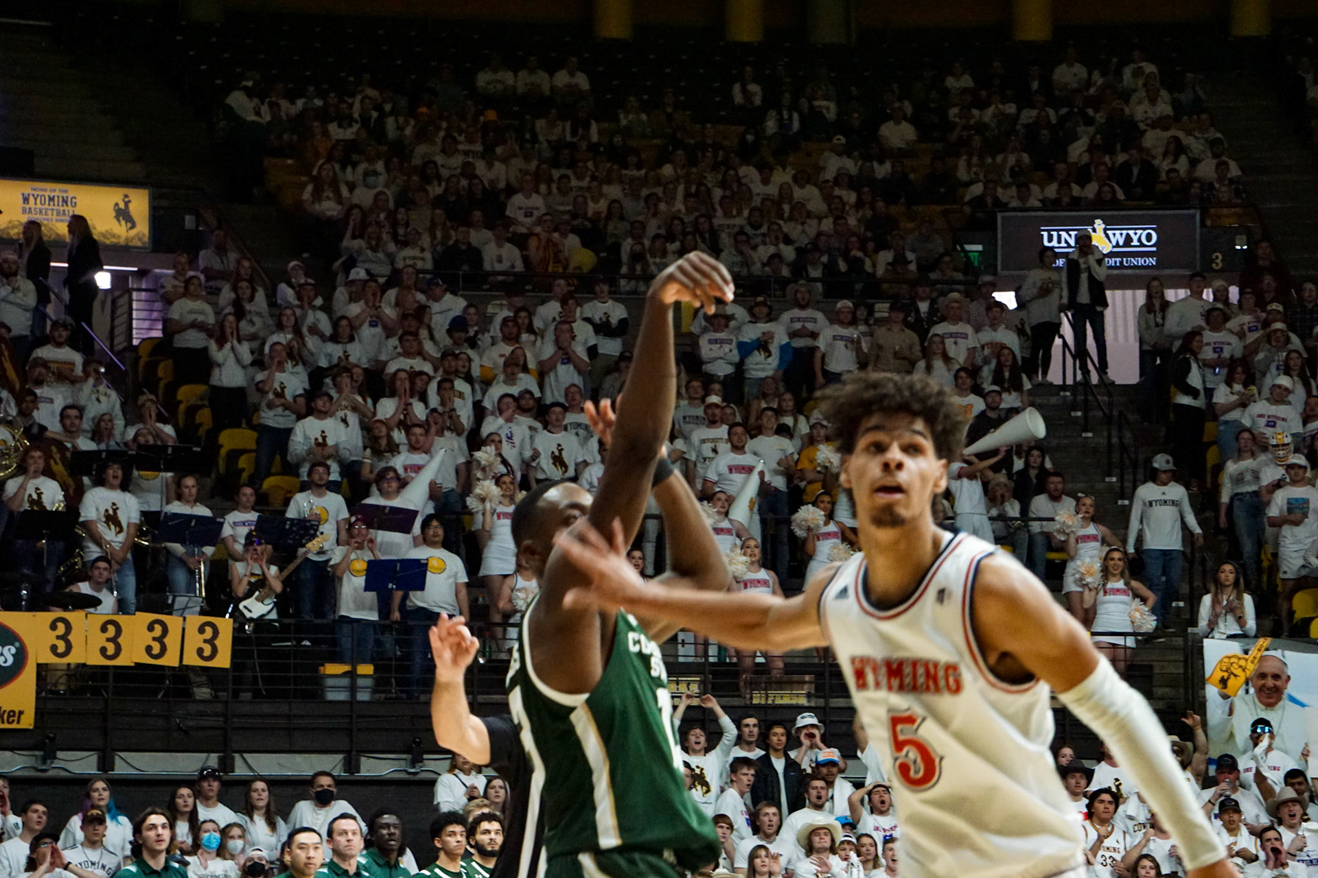 Chandler Jacobs shooting a three point shot