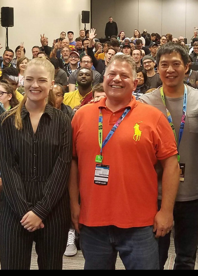 Katherine Brown, Buddy and Sean Chen take a bow after another successful Comic Book School panel at NYCC 2018.
