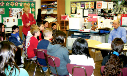 Darren Sanchez speaks to a 6th grade class about creating comics.