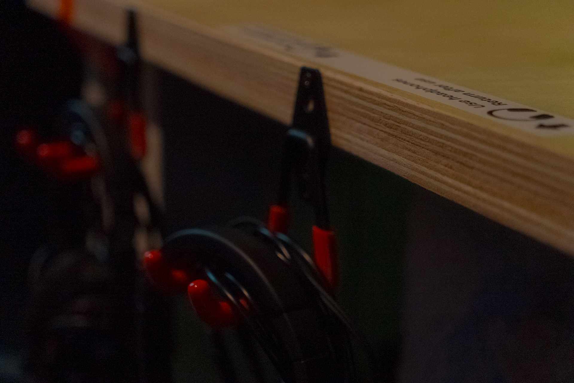Headphones holder for artwork