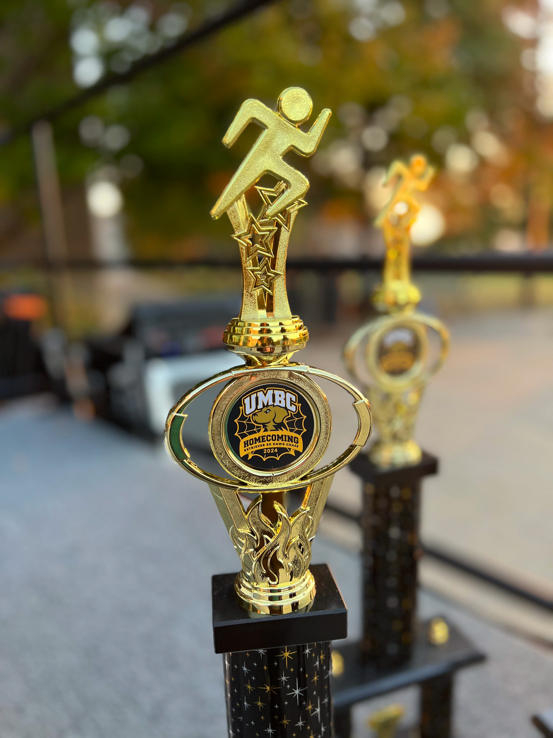 Homecoming medal design on the 5k trophy.
