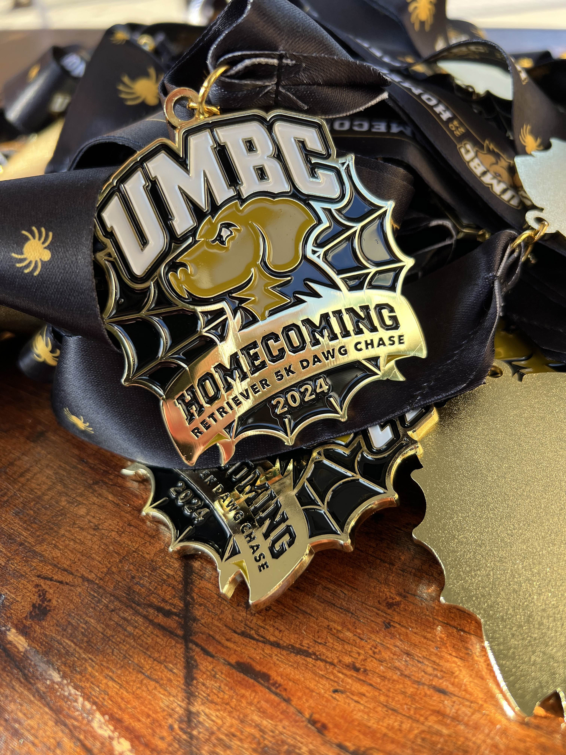Homecoming 5k Dawg Chase medal and lanyard.