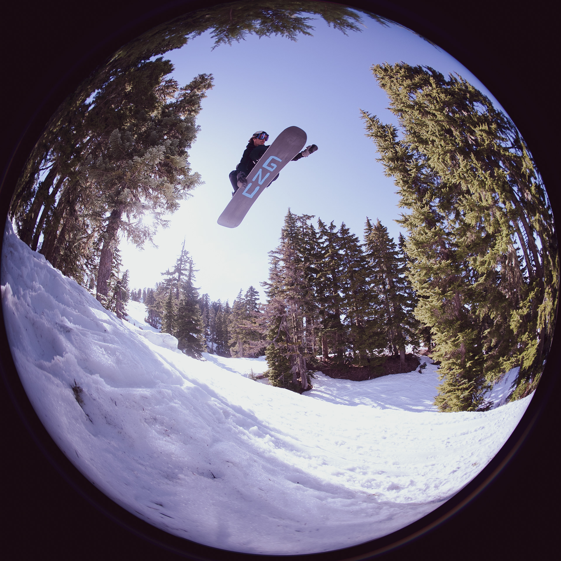 Canyon Gesmundo, indy grab over Jamie Lynn jump, Mt. Baker.