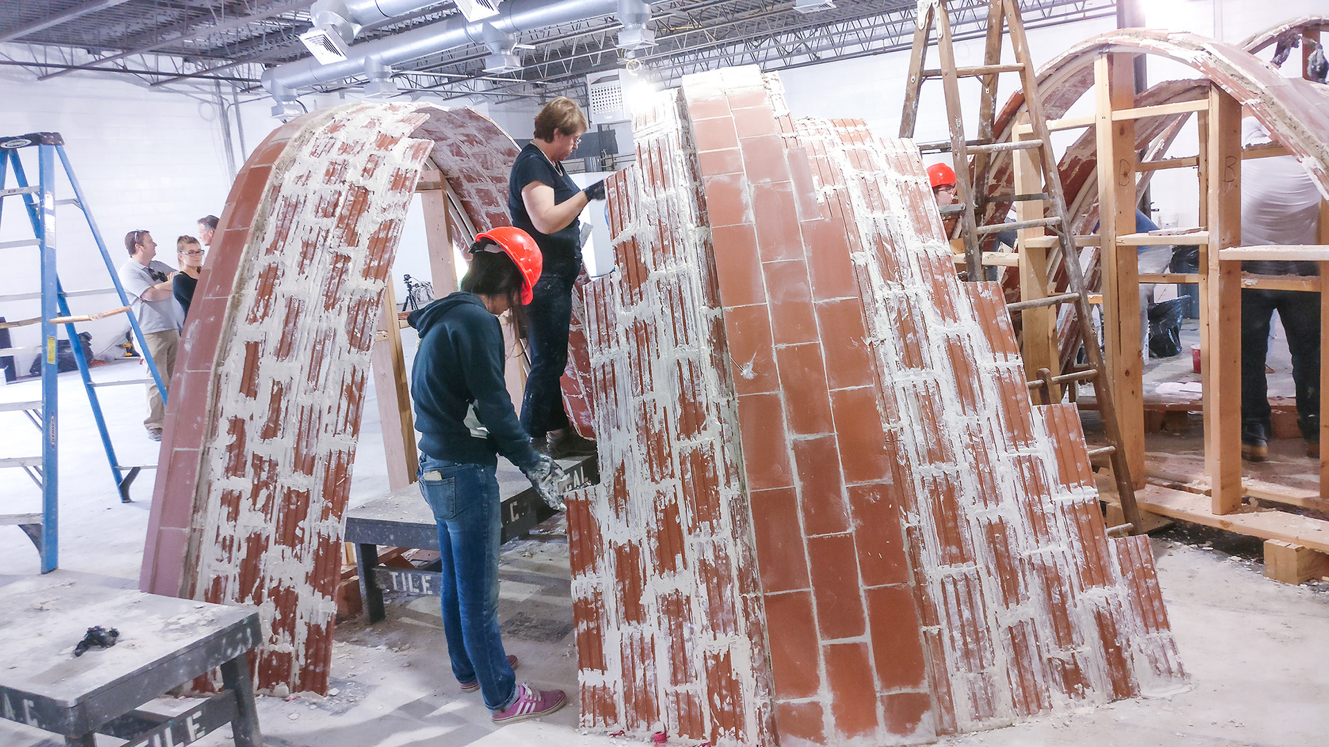Expanding the arches to build the skin in between. Professor Franca first hand working with the team