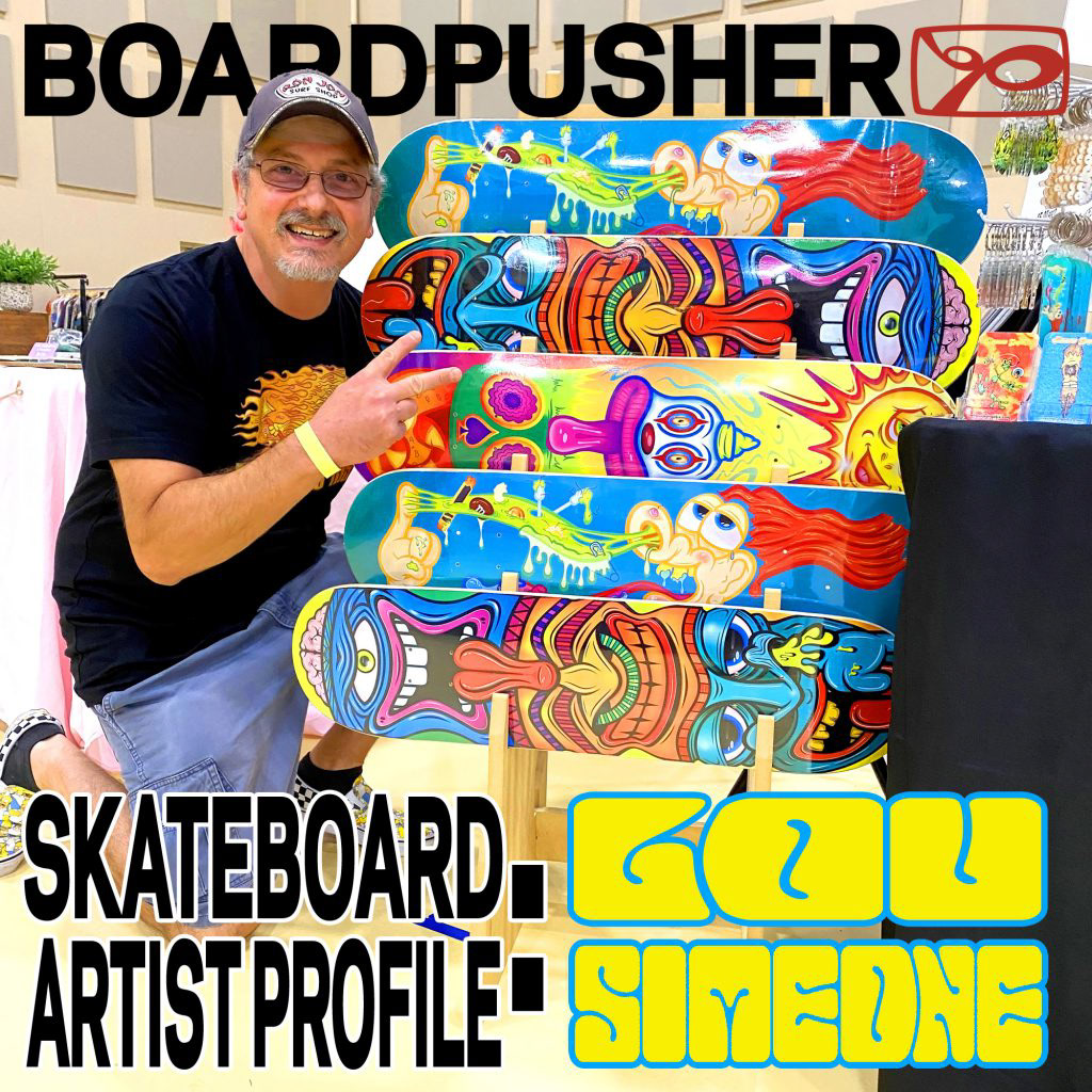 Lou Simeone of Simeone Graphix making a peace sign while posing with his skateboards