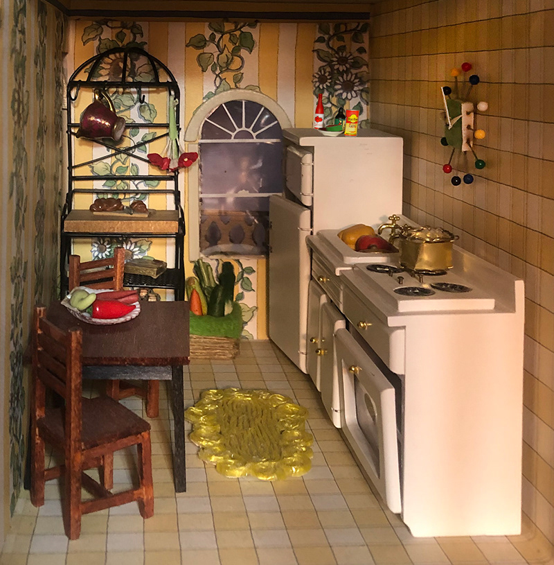 KITCHEN: SISEL RUG, 50s CLOCK (pins, foam core), TABLE & CHAIRS (wood), VEGGIE FLOOR BASKET (jute, felt), POT (brass, button)