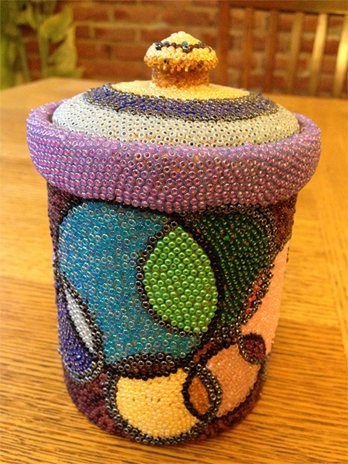 TERRACOTTA JAR: glued seed beads