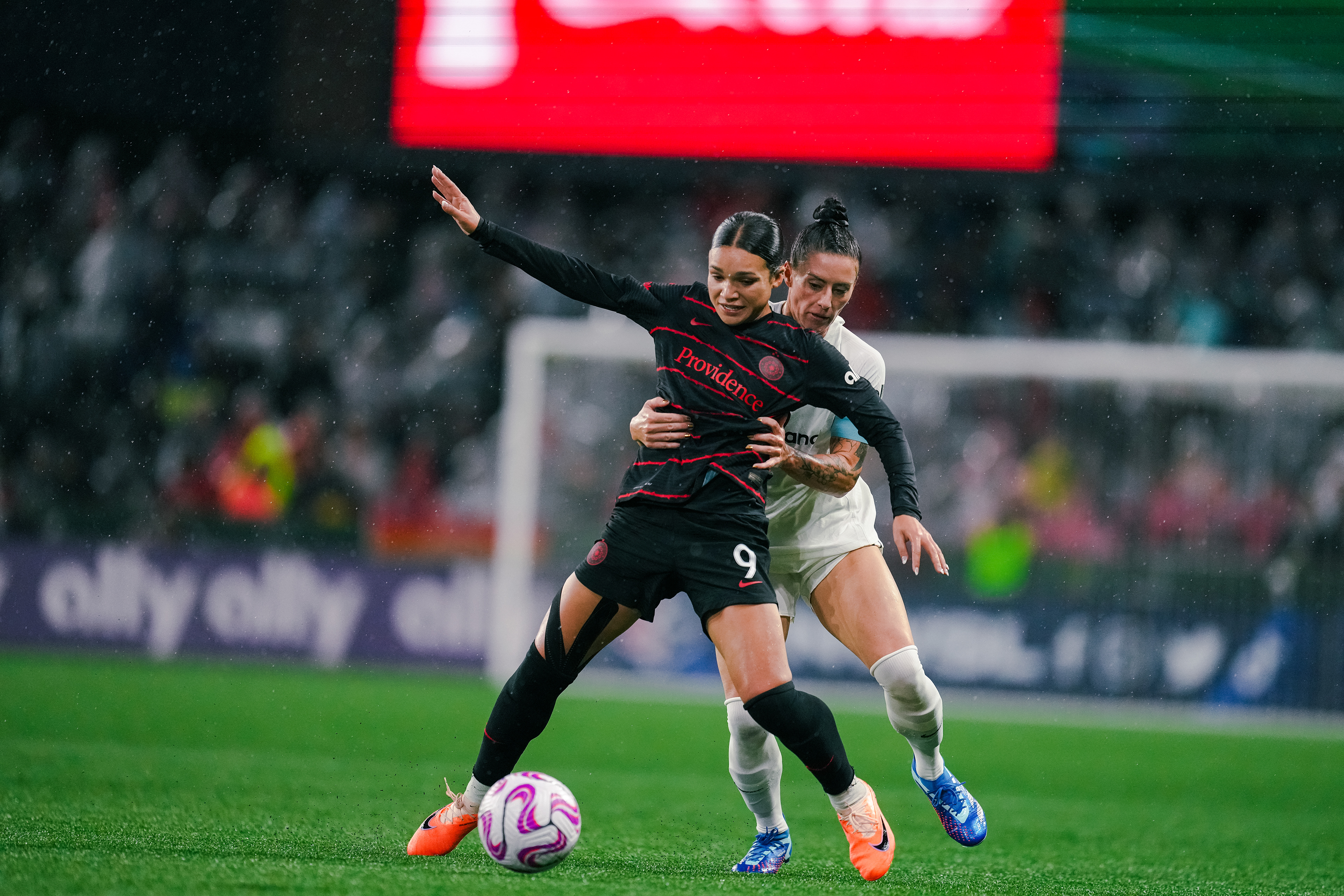 GFC Captain Ali Krieger and Thorns Sophia Smith