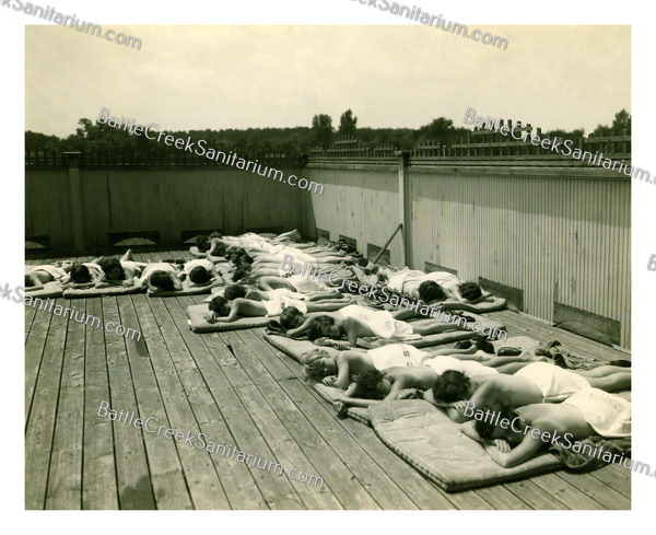 TO-90 sunbathing on roof at Battle Creek Sanitarium/college