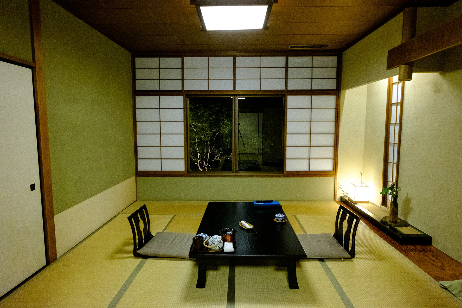 Kaiseki unfolding dish by dish on tatami, each plate more carefully arranged than the las