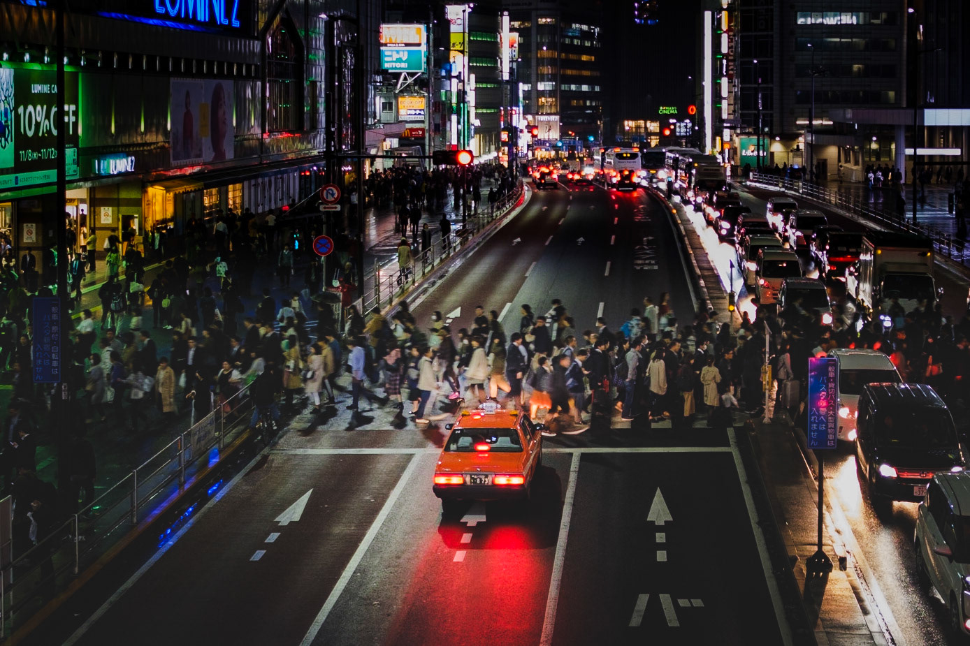 Evening rush in Shinjuku — a sea of movement beneath Tokyo’s glowing towers.